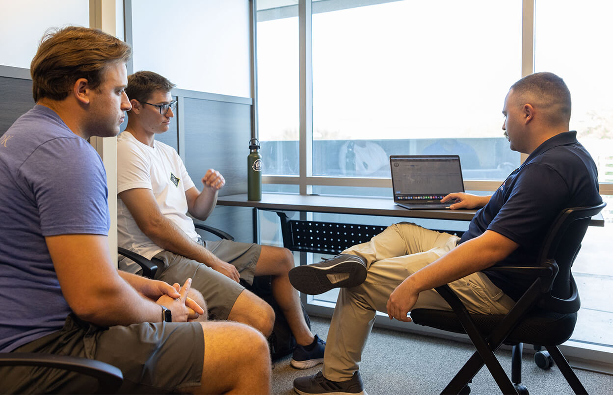 sierra charlie instructor meeting with two students
